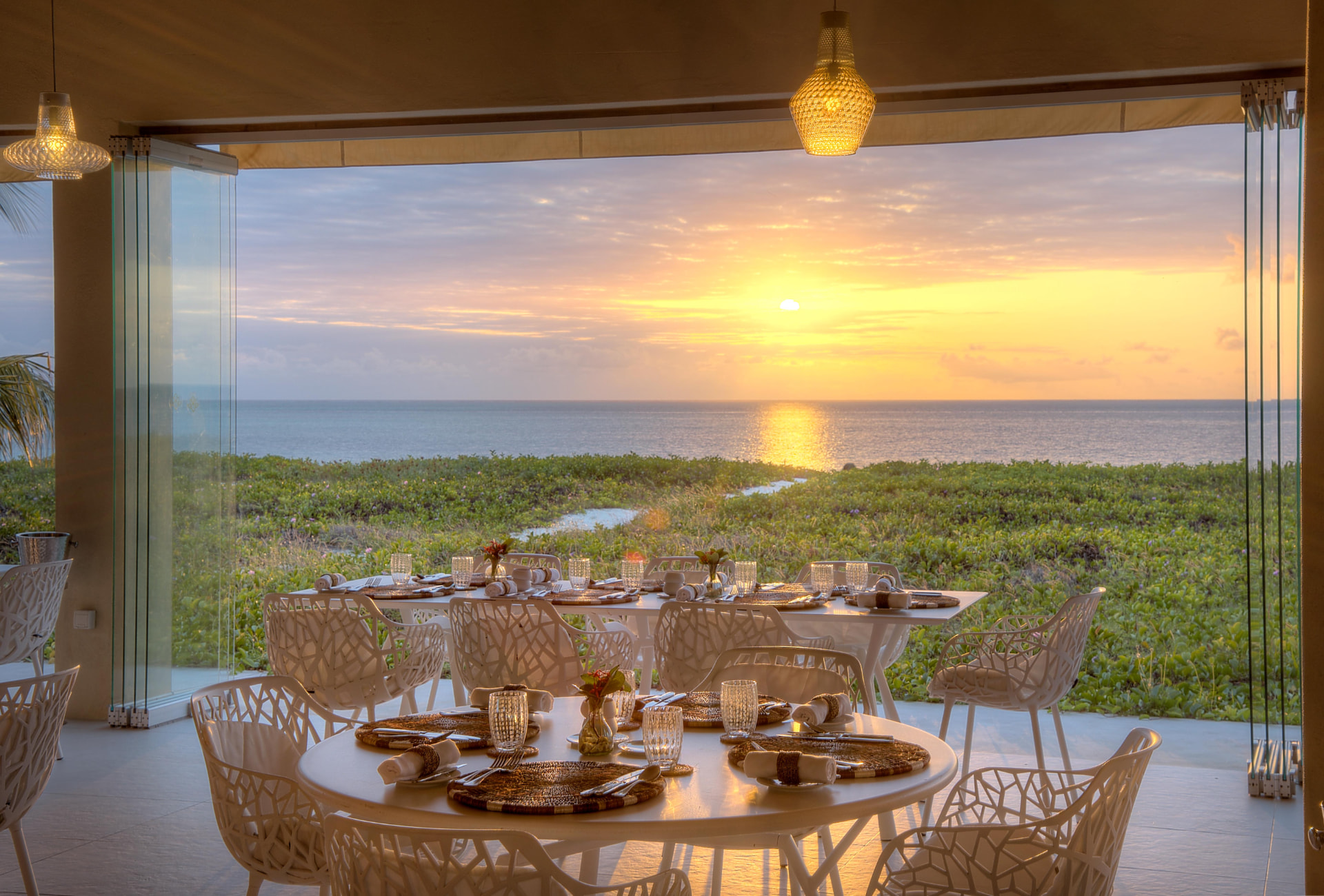 Beach restaurant at sunrise at Zanzibar White Sand Luxury Villas & Spa